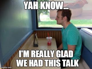 Image of a man speaking to a wall.